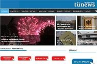 Ansicht der Startseute von tunewsinternational.com, Hauptbild vom Silvesterfeuerwerk, mehrsprachige Navigationselemente, Beschriftung im Kopf "tünews International""